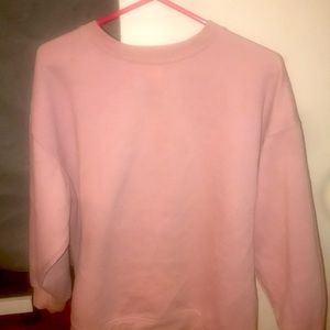 Size Large, pink crew neck, barley worn.